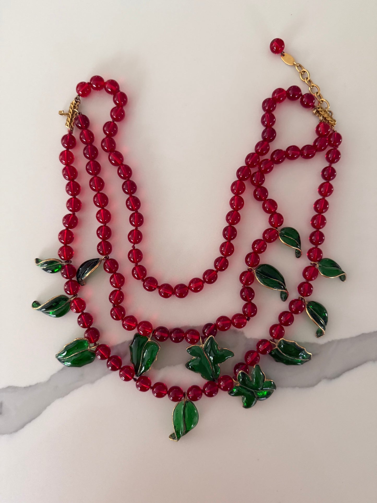 Chanel Gripoix three strand red bead & large green poured glass leaves