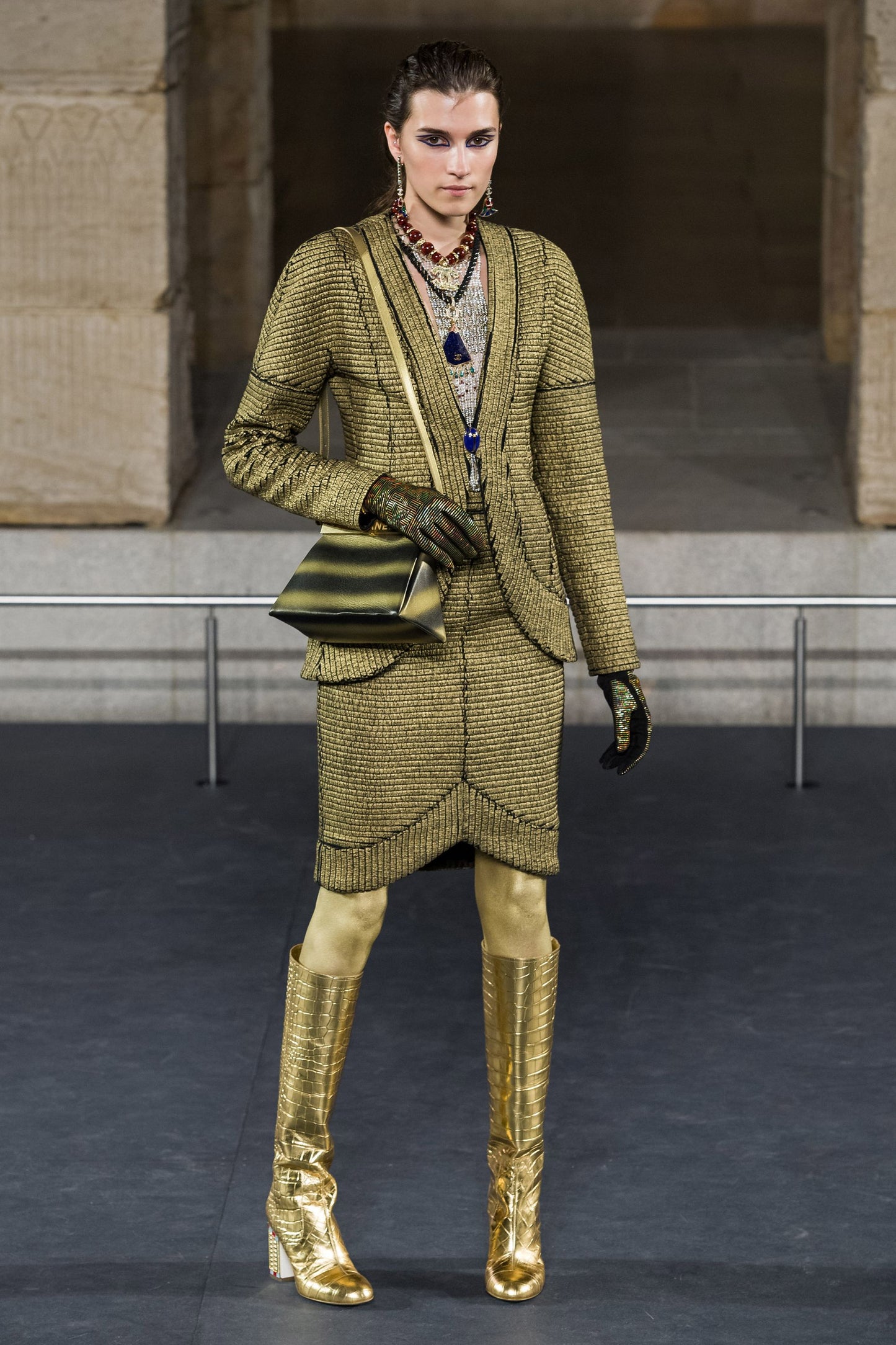 CHANEL, black wool jacket with gold trim and scarab-shaped button, new pre-collection 2019