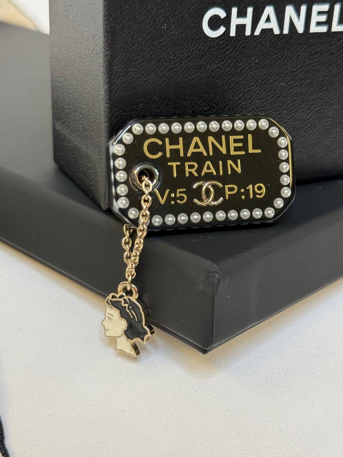 Pre-loved Chanel Black Resin Coco Train Ticket Brooch With Charm