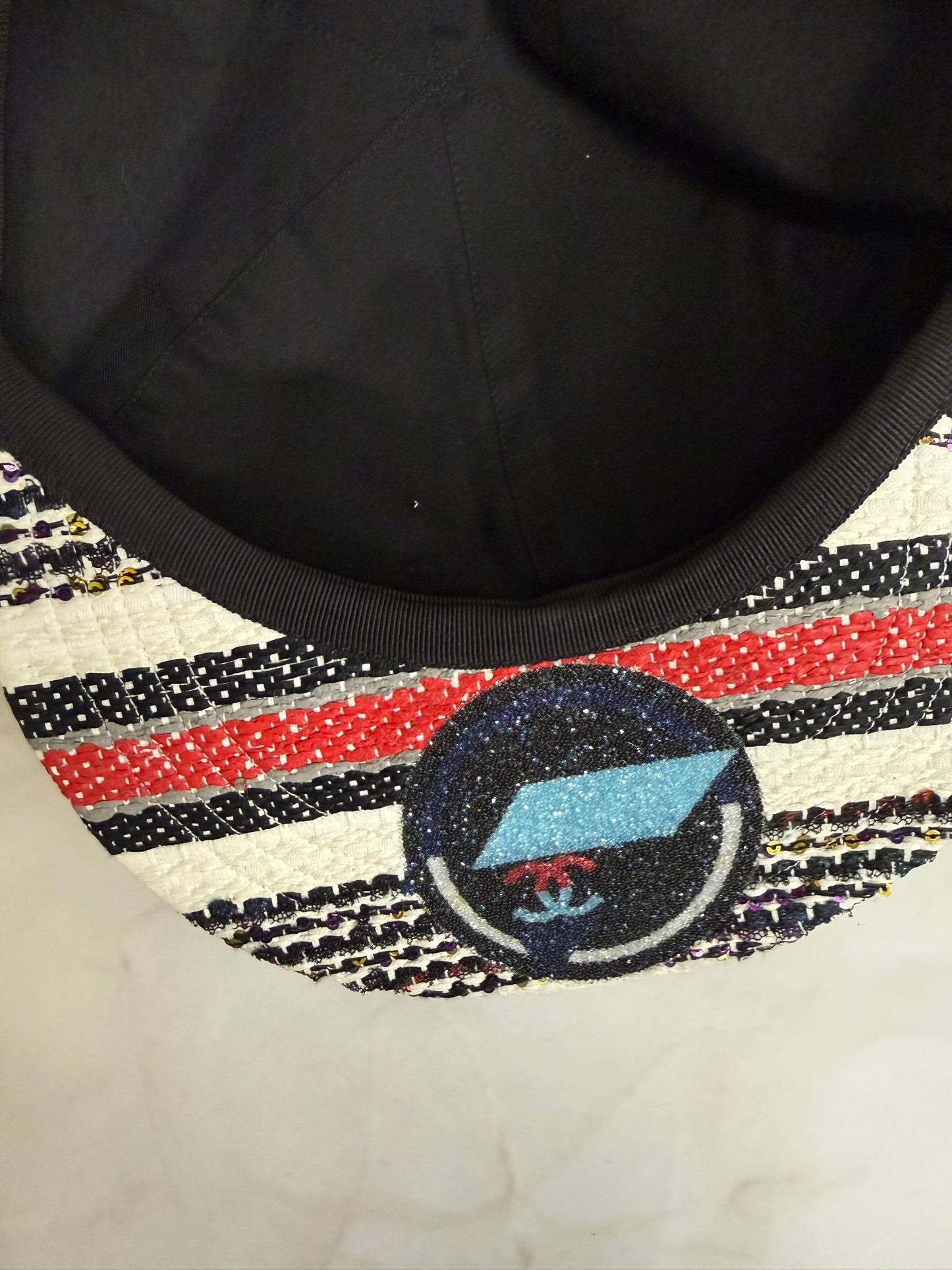 Chanel airline runway tweed embellished cap