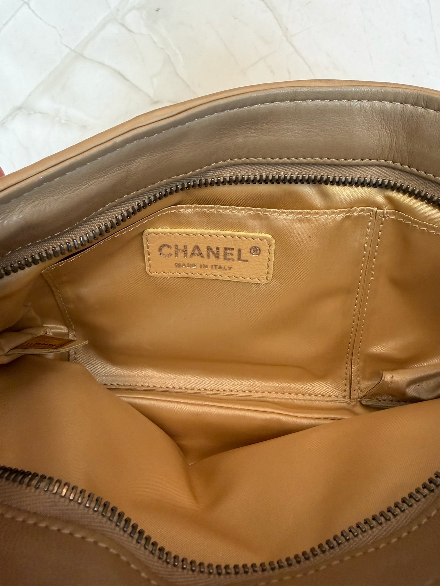 Chanel Gold Python Clutch with gunmetal hardware and big logo zipper pull