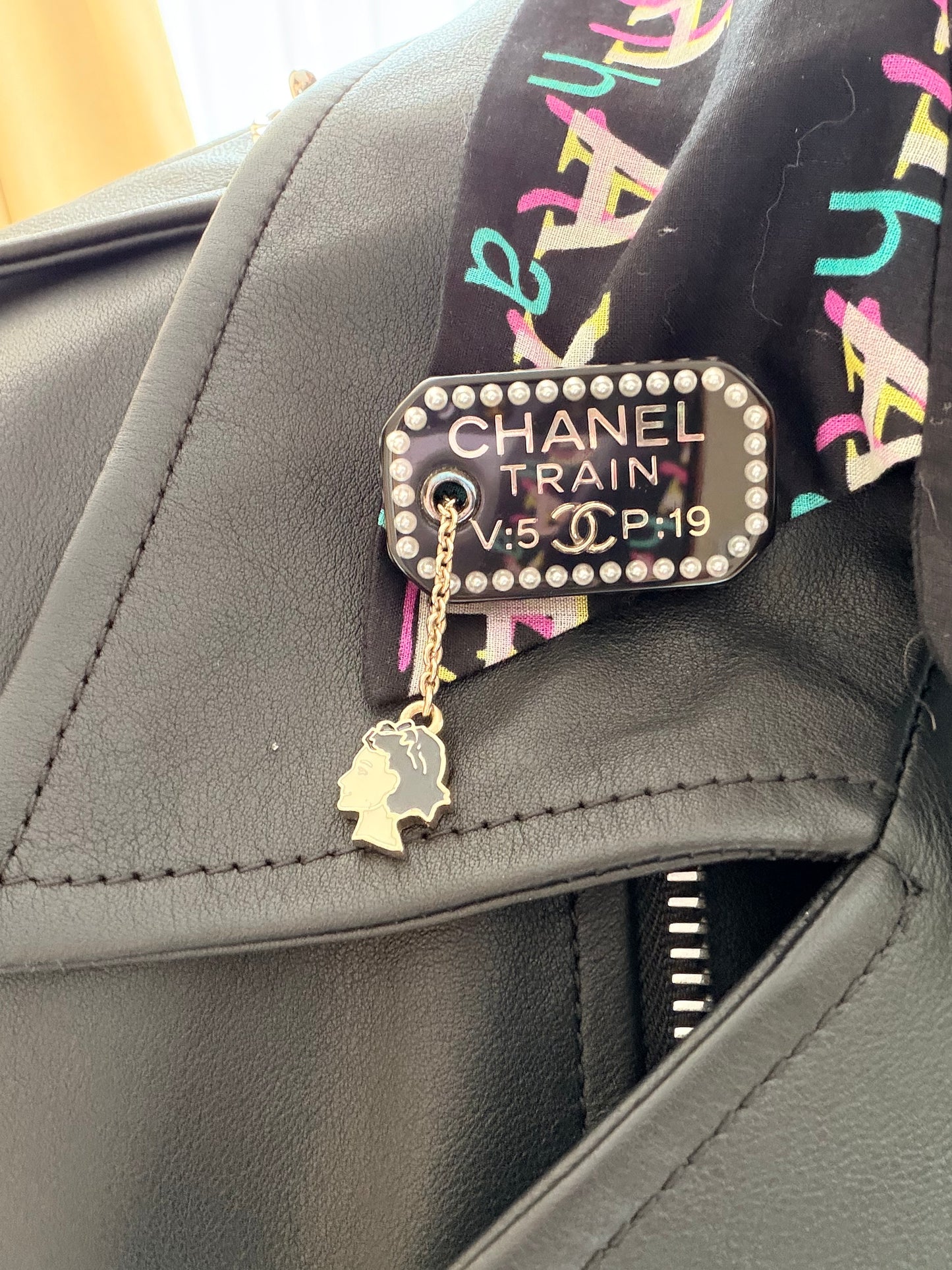 Pre-loved Chanel Black Resin Coco Train Ticket Brooch With Charm