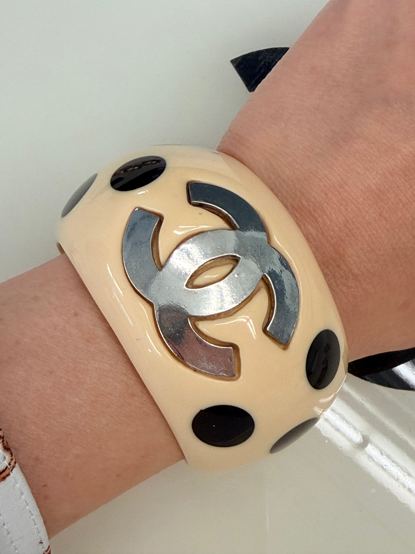 Chanel Cuff/bangle with big CC's and black dots, acryl, signed 96P - 1996