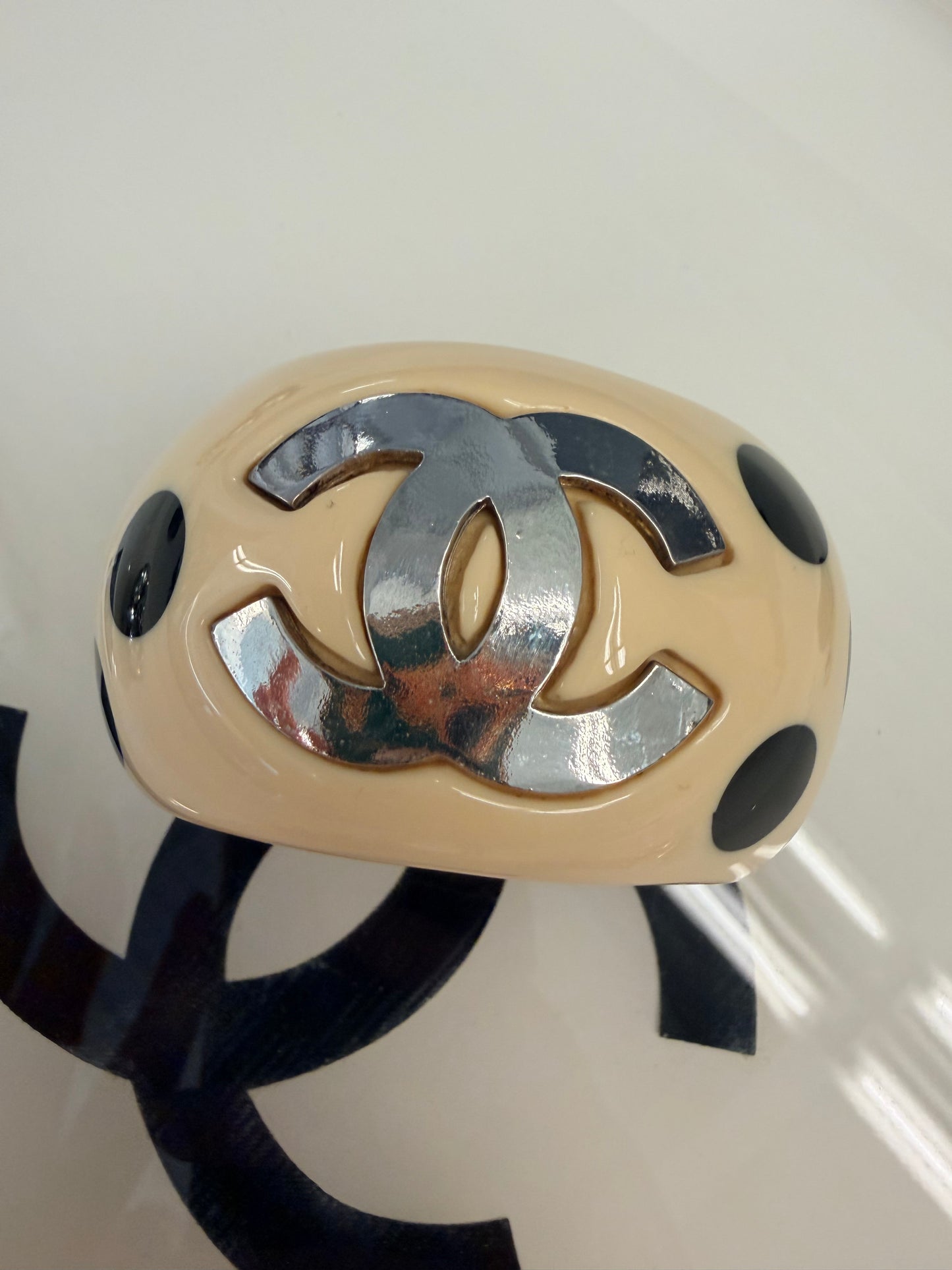 Chanel Cuff/bangle with big CC's and black dots, acryl, signed 96P - 1996