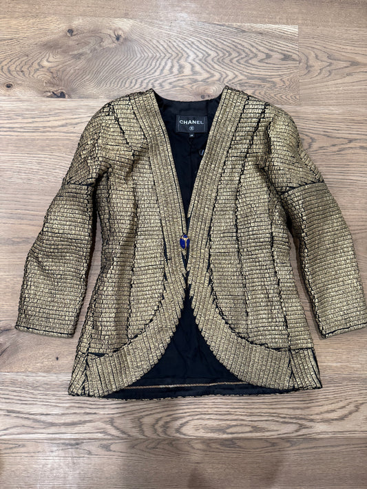 CHANEL, black wool jacket with gold trim and scarab-shaped button, new pre-collection 2019