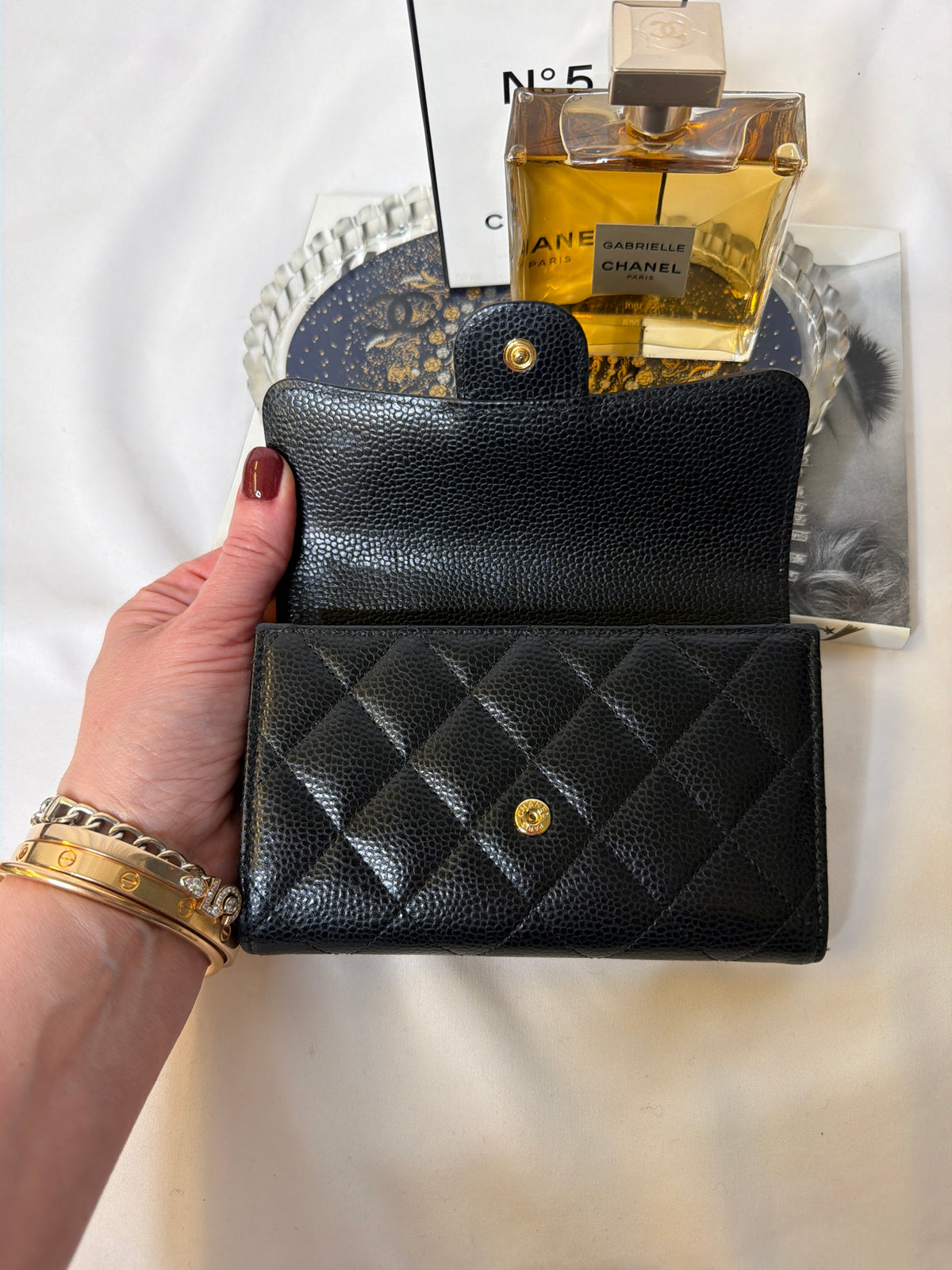 Chanel Medium Caviar Trifold wallet in black with gold hardware