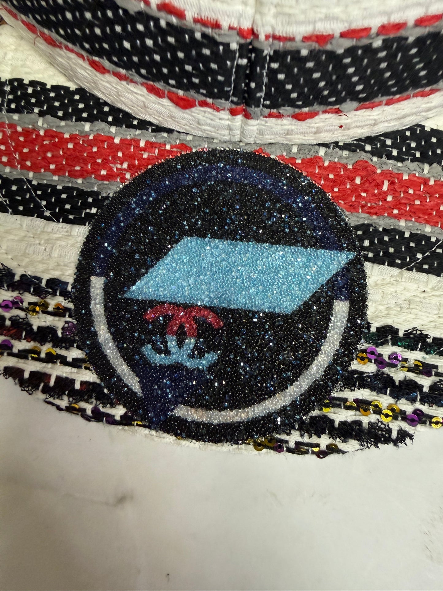 Chanel airline runway tweed embellished cap