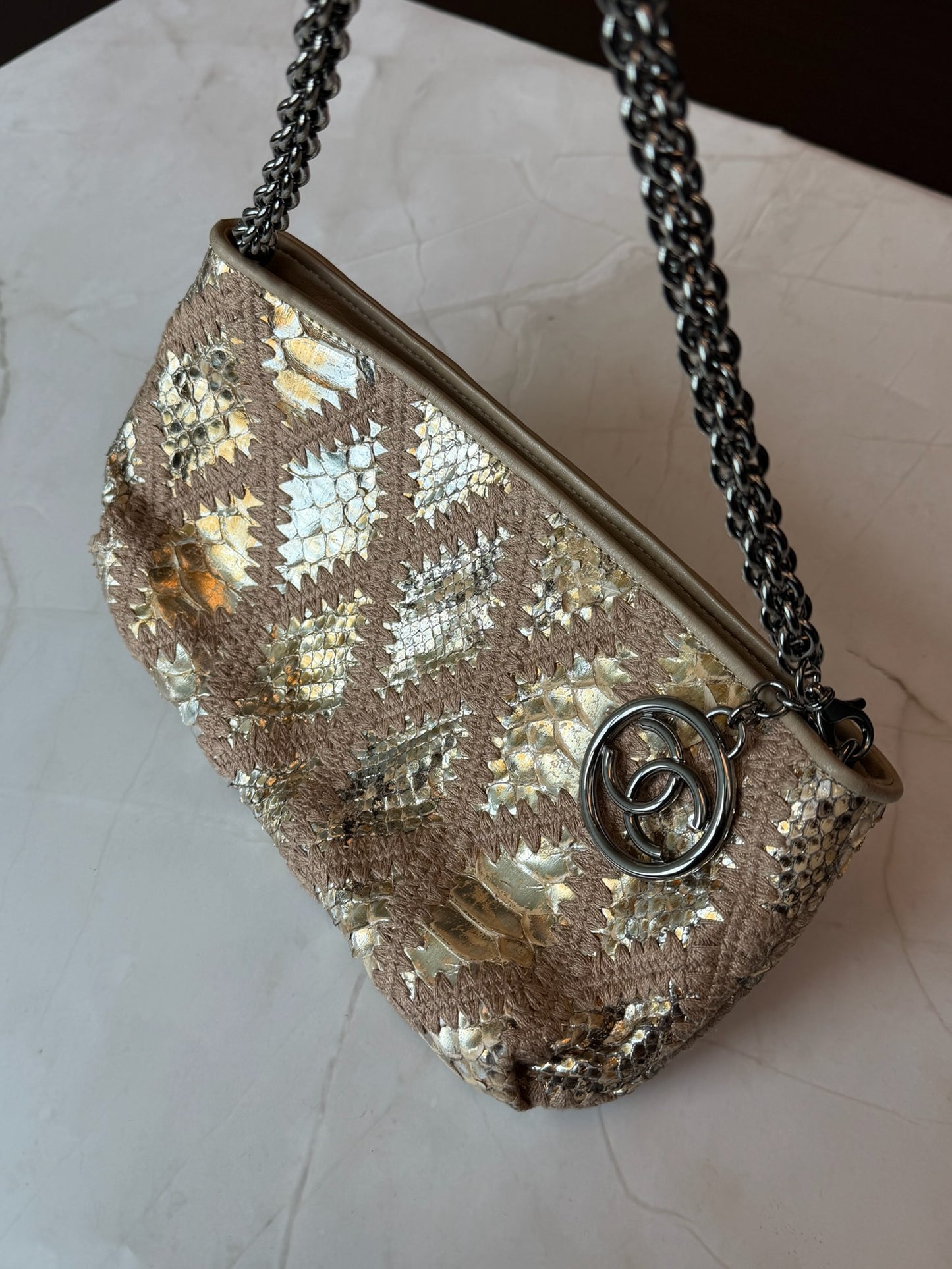 Chanel Gold Python Clutch with gunmetal hardware and big logo zipper pull