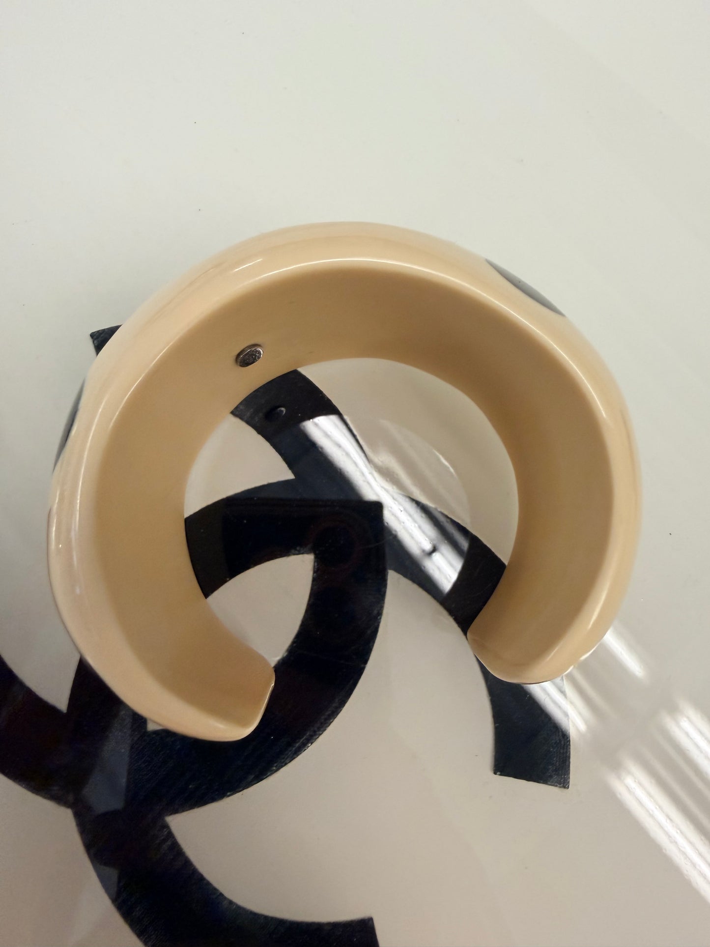 Chanel Cuff/bangle with big CC's and black dots, acryl, signed 96P - 1996