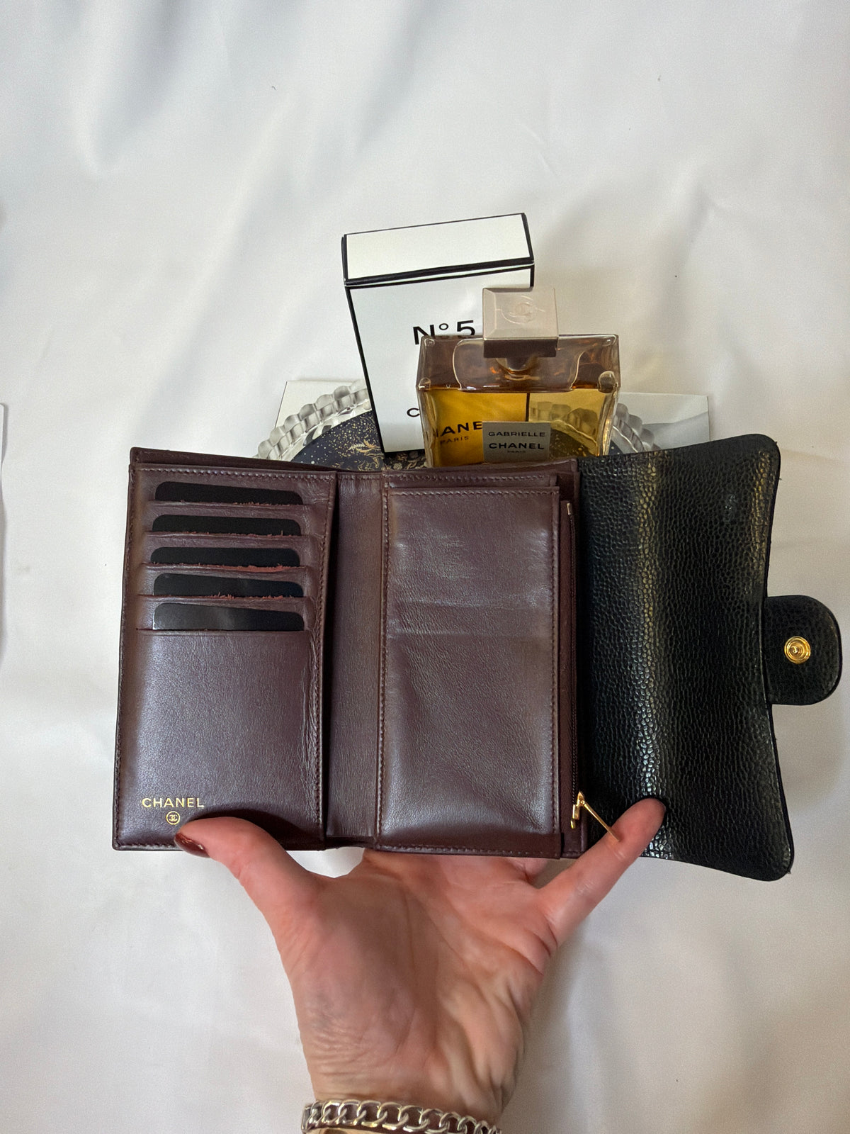 Chanel Medium Caviar Trifold wallet in black with gold hardware