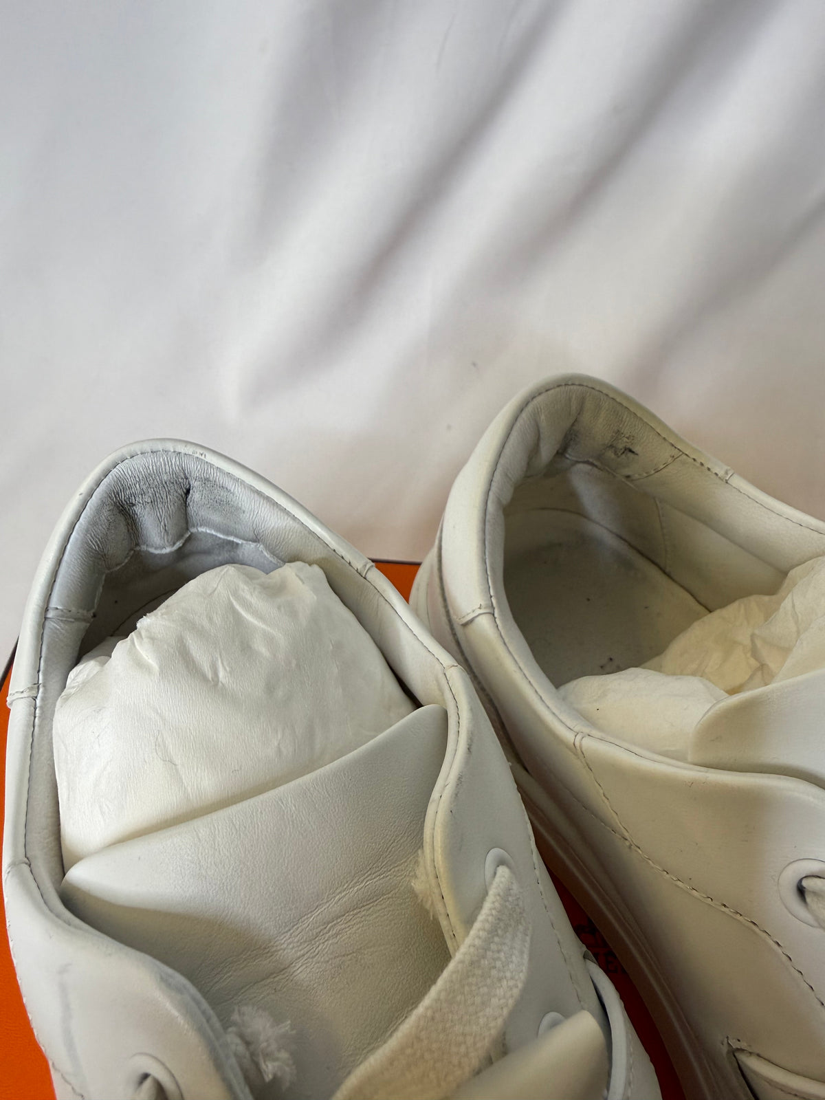 Hermes’ Day Kelly Buckle sneakers in rose gold in size 37.5