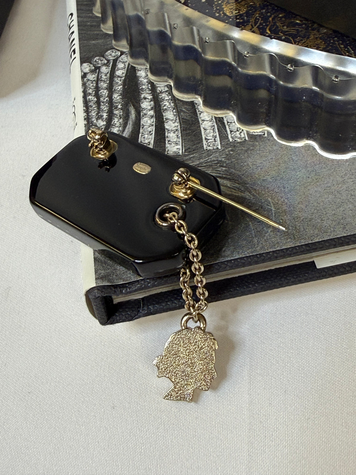 Pre-loved Chanel Black Resin Coco Train Ticket Brooch With Charm