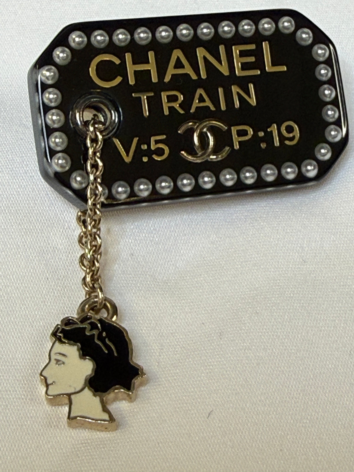 Pre-loved Chanel Black Resin Coco Train Ticket Brooch With Charm