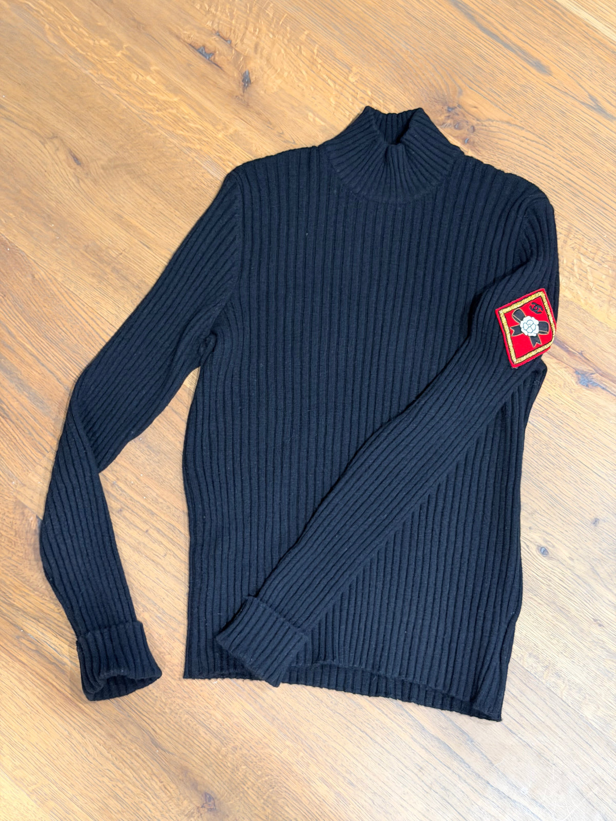 Chanel Black Turtleneck with diamond CC patch on sleeve