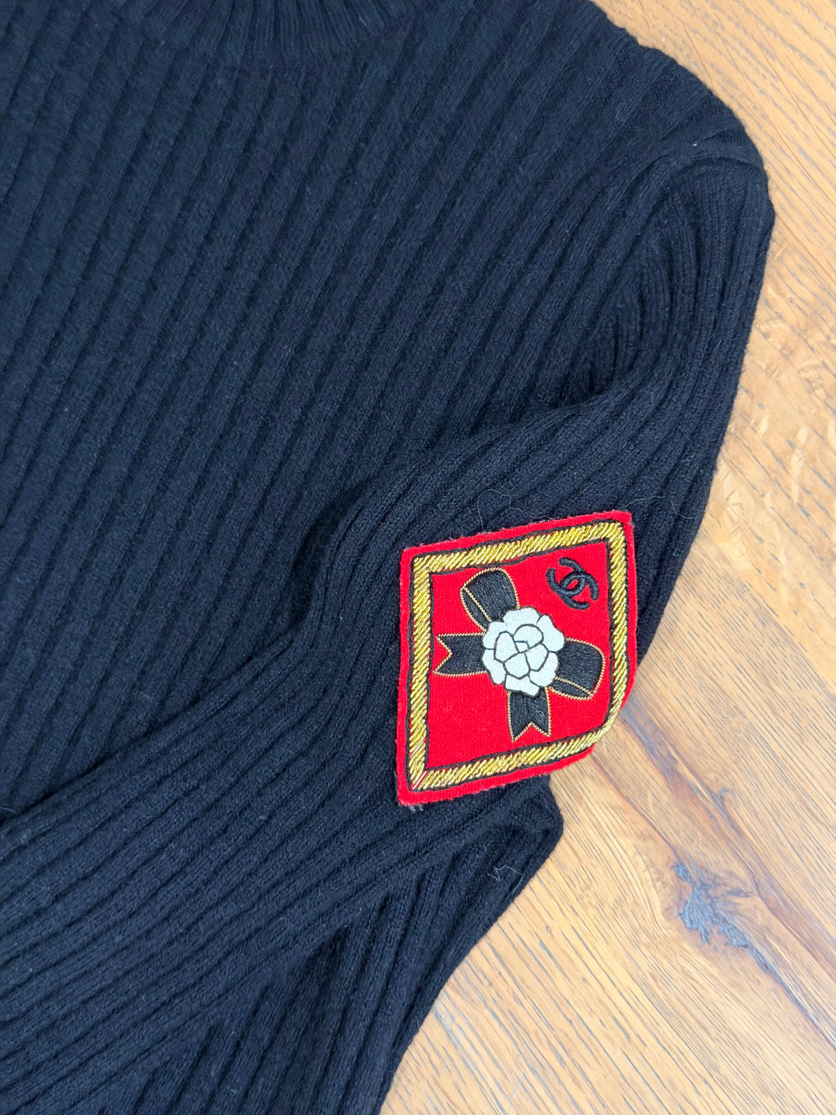 Chanel Black Turtleneck with diamond CC patch on sleeve