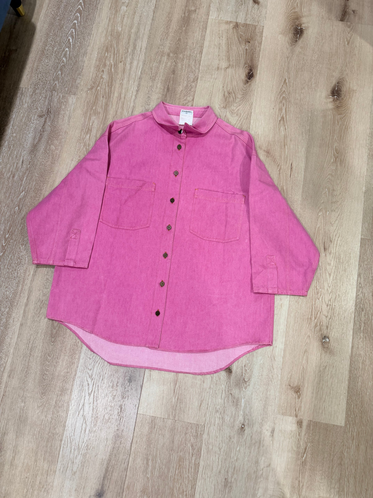 vintage Chanel pink denim oversized button-down shirt from their 1999 Spring/Summer collection