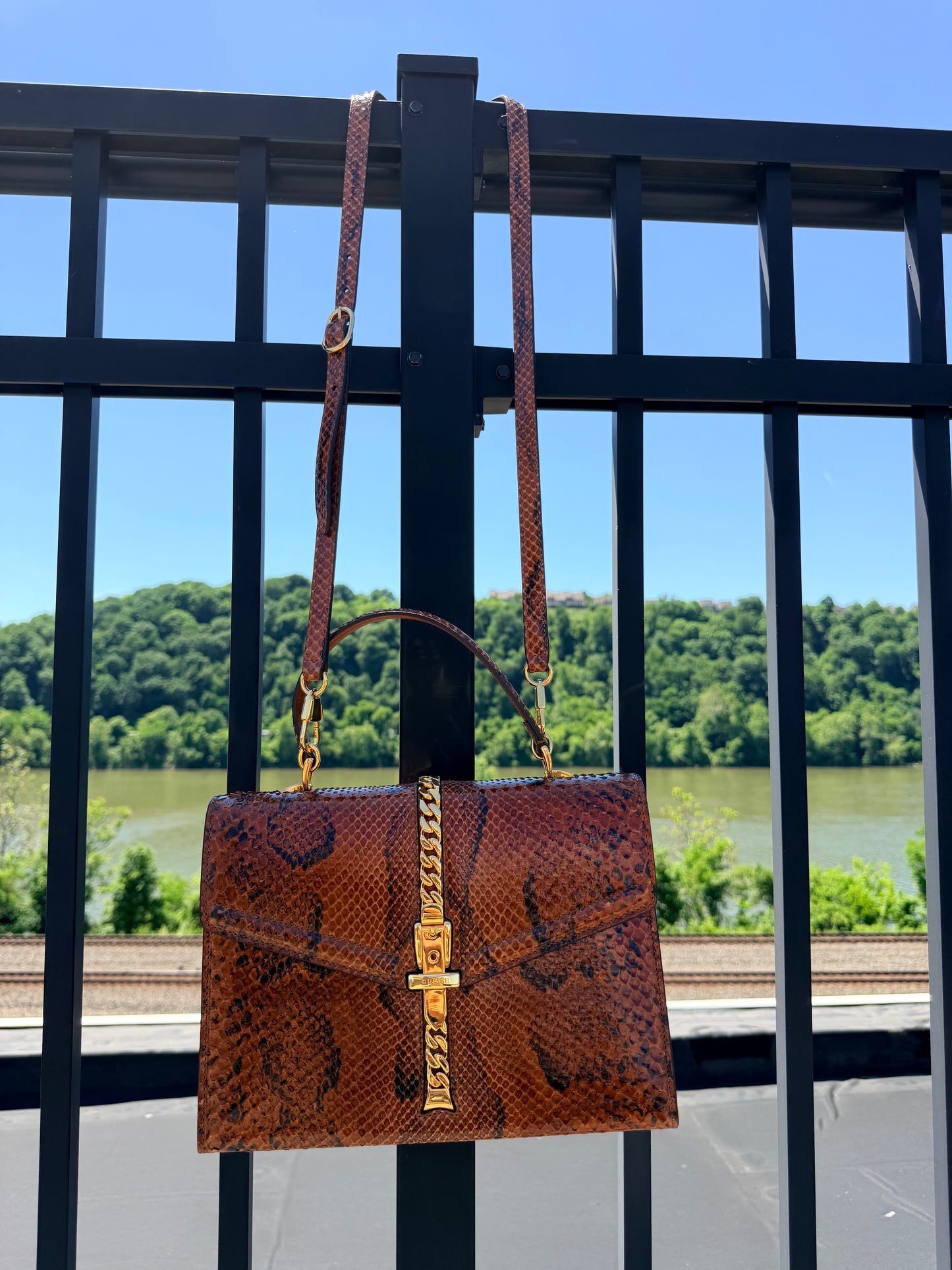 Gucci. Brown python skin Sylvie 1969 tote bag
