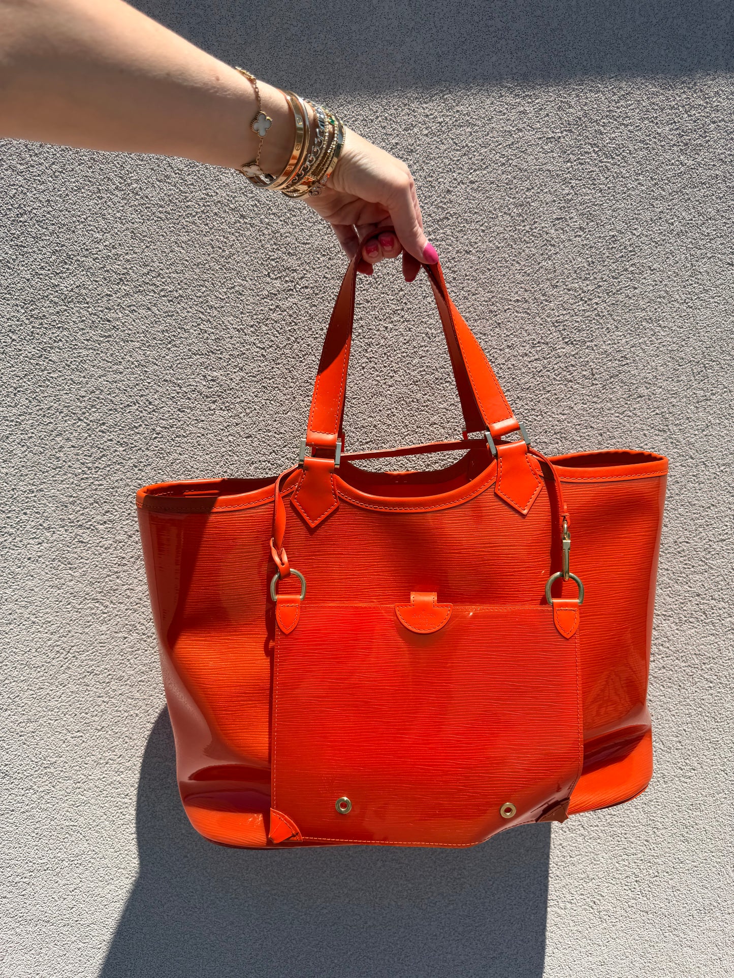 Louis Vuitton Epi Plage Lagoon Bay handbag in a vibrant orange