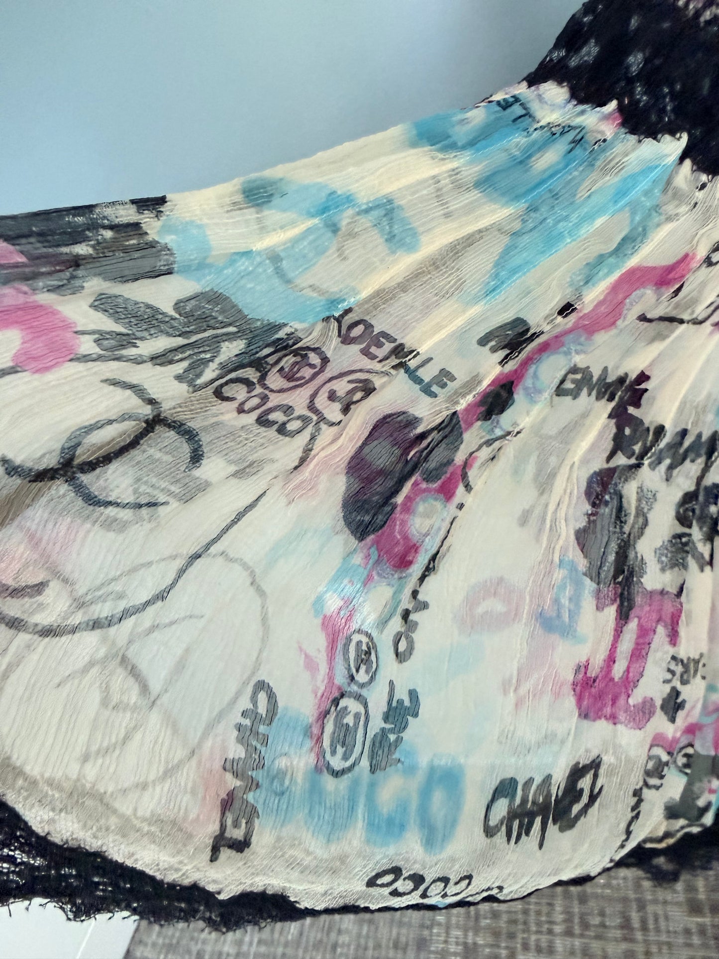 Chanel Silk Tank top in iconic Graffiti print and lace.