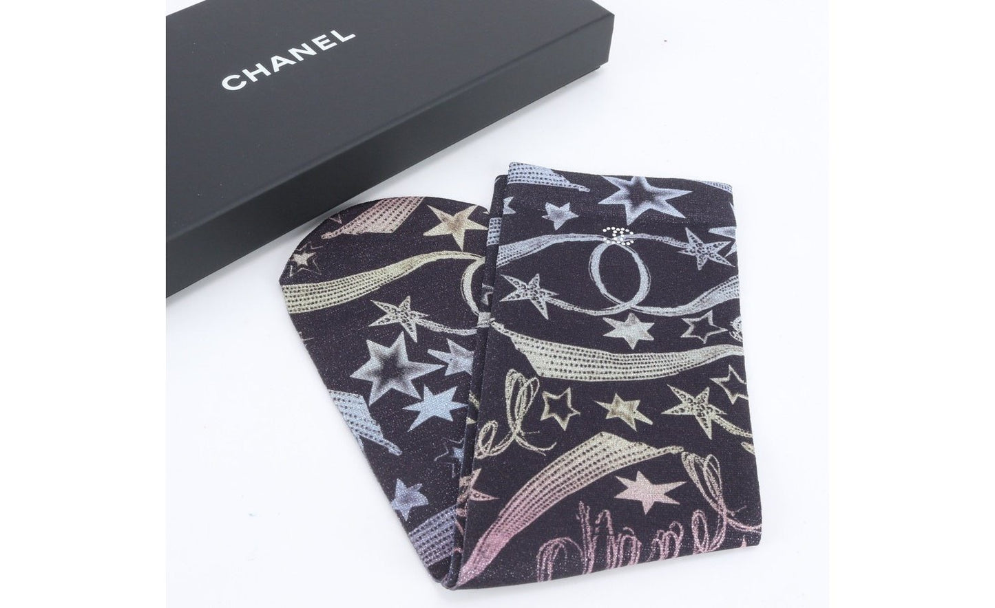 From the Cruise 2024 Collection by Virginie Viard. Rainbow nylon Chanel socks with star and logo print throughout. Includes box. One Size.