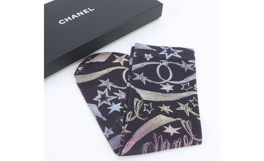 From the Cruise 2024 Collection by Virginie Viard. Rainbow nylon Chanel socks with star and logo print throughout. Includes box. One Size.