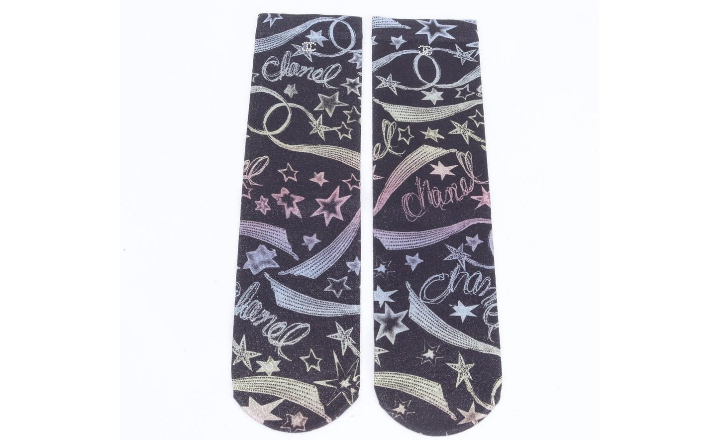From the Cruise 2024 Collection by Virginie Viard. Rainbow nylon Chanel socks with star and logo print throughout. Includes box. One Size.