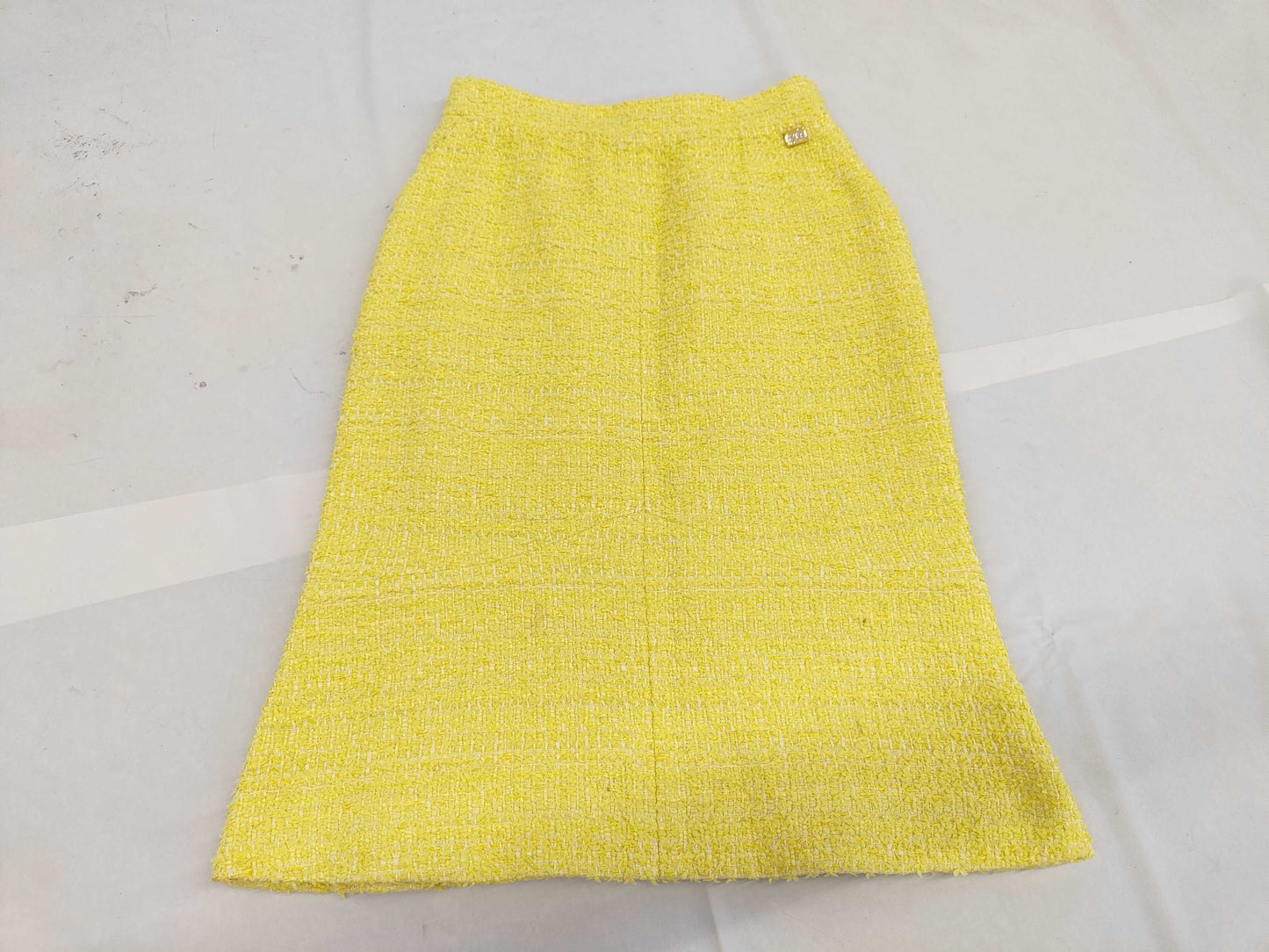 Chanel Yellow Tweed skirt with rhinestone CC charm logo