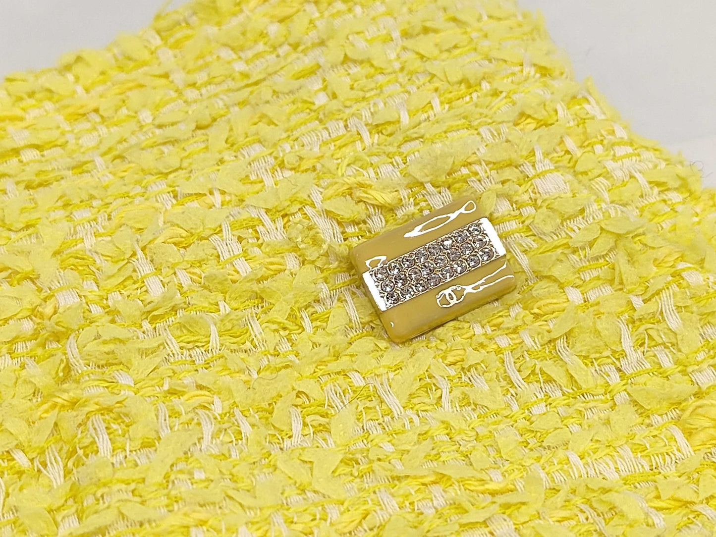Chanel Yellow Tweed skirt with rhinestone CC charm logo
